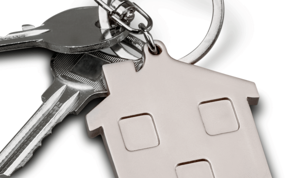 House-shaped keyring attached to a set of door keys